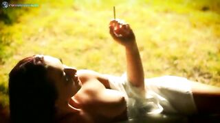 Sandra Romain smokes a cigarette and masturbates in the park