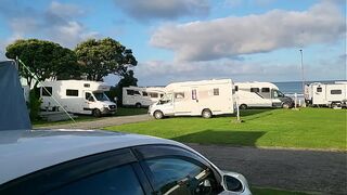 Filthy Kiwi mature beautiful erotic MILF pisses on the ground at the campground while campers are around