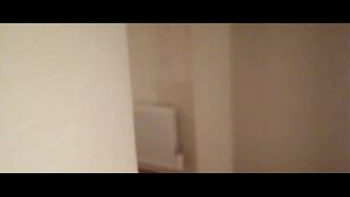 naughty sexy MILF in stockings and heels walks through the corridors of a hotel