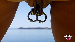 nippleringlover kinky mother double rings in extreme pierced nipples fingering pierced pussy and pissing at nude beach