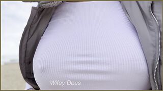 Braless gorgeous wife walks on the public beach